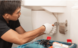 Maintenance team working in the toilet